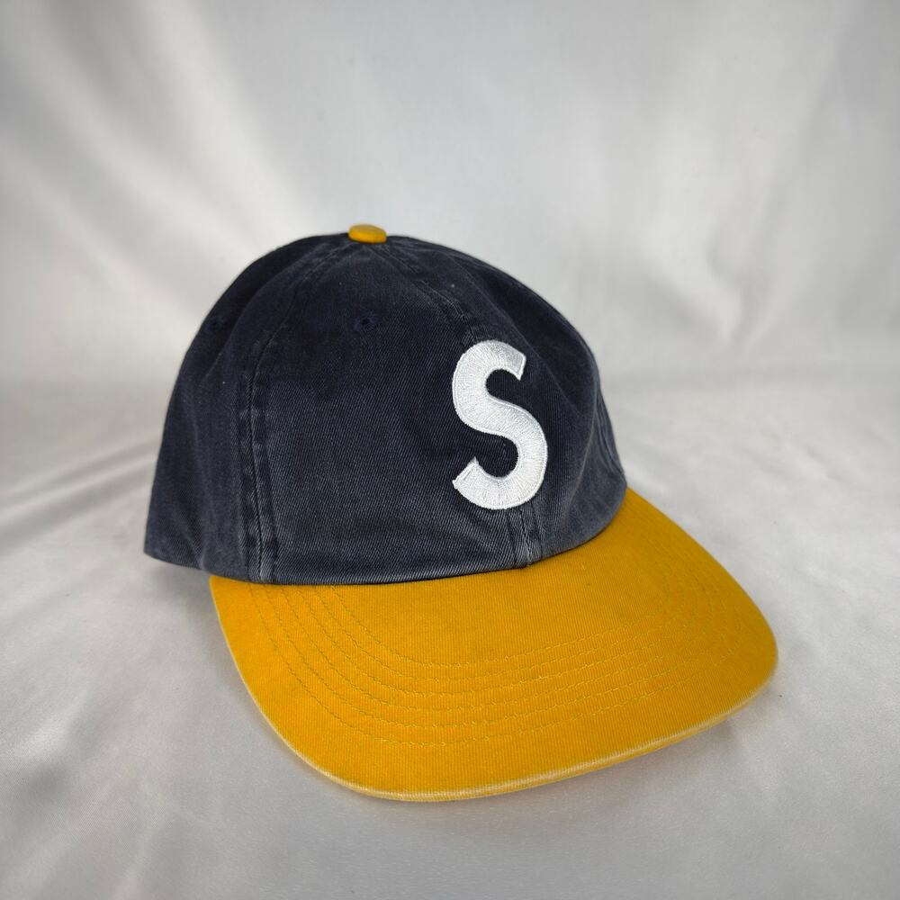 Supreme Cursive S Logo Snapback Hat Navy Crown Yellow Brim Made in USA
